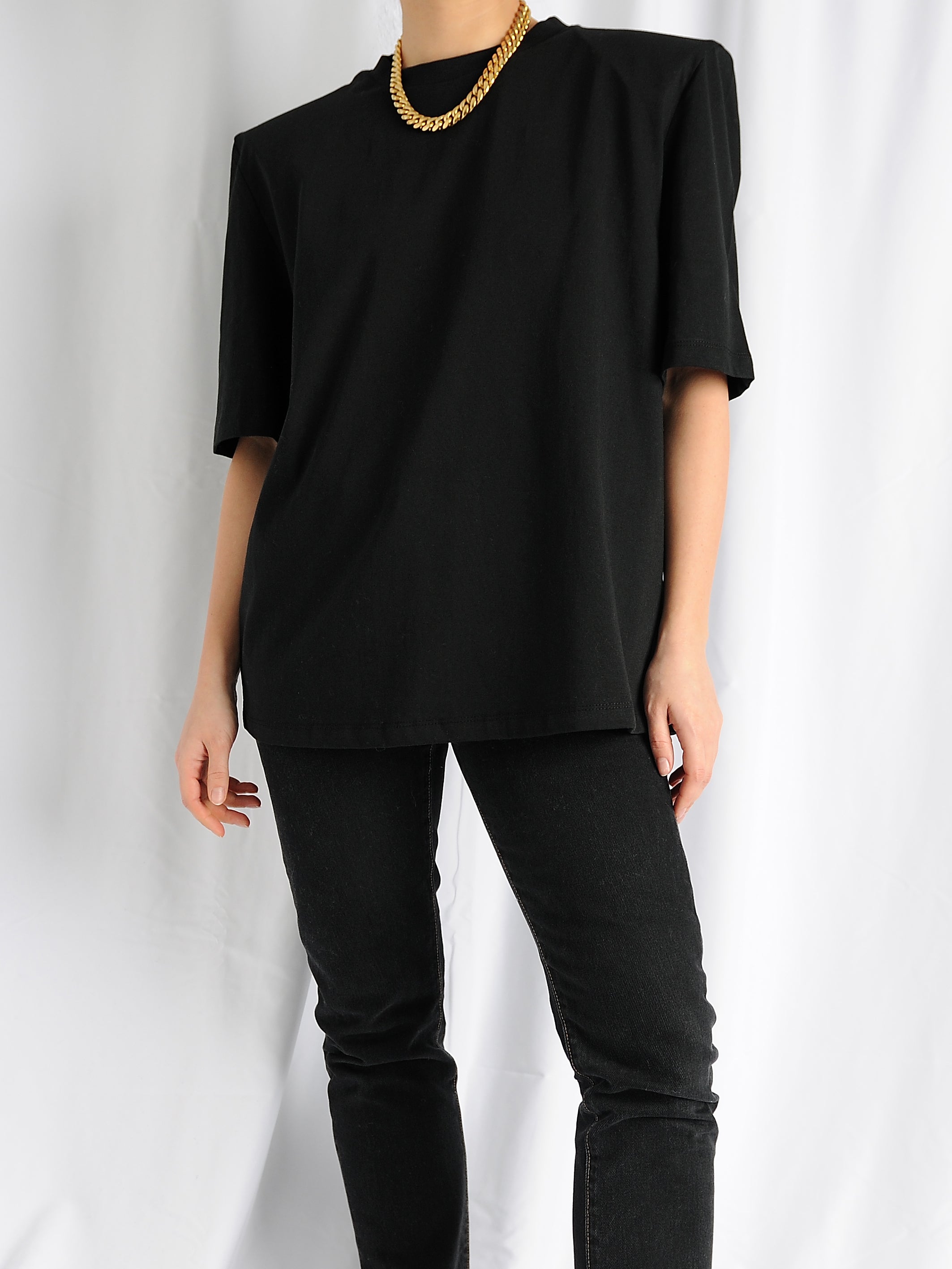 Black t shirt discount with shoulder pads